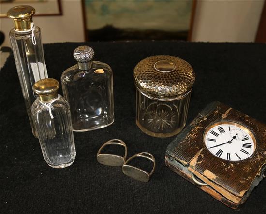 4 silver topped bottles & pair of stirrups